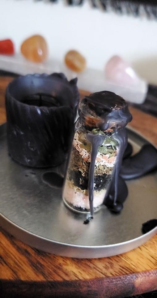 Galaxy-black resin octopus with goddess torsos
