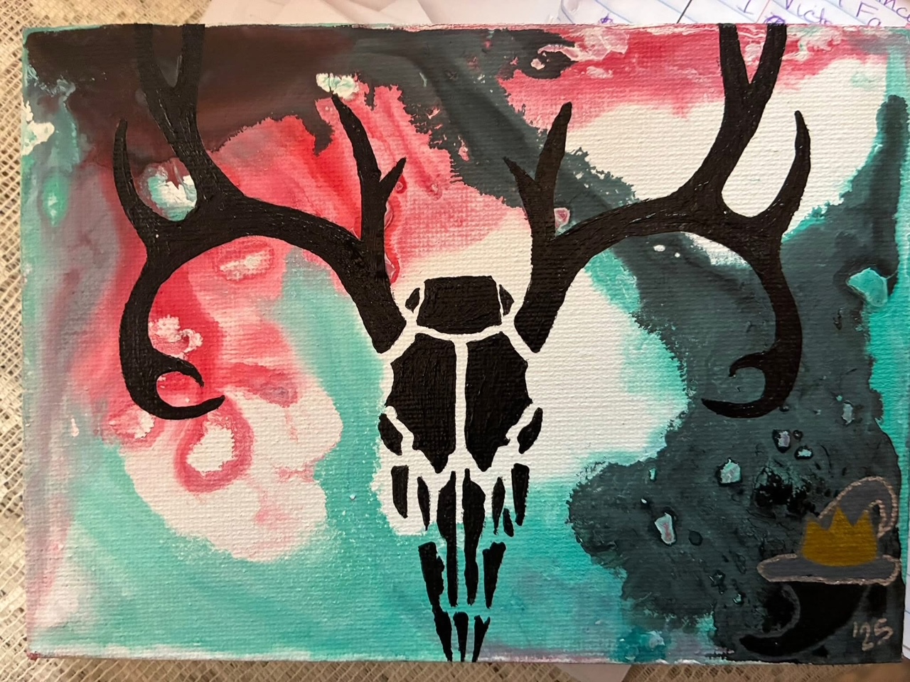 Antler skull symbolic painting over a coral and teal background